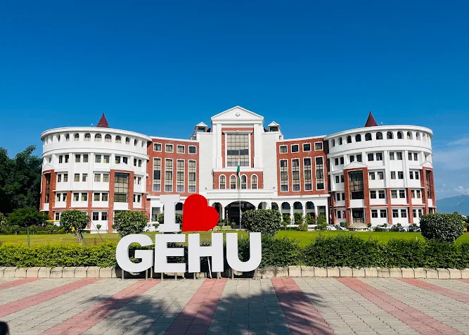 Graphic Era Hill University (GEHU) Dehradun modern campus building with lush green surroundings